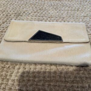 White further clutch bag from the famous Pantera brand. In perfect conditions.